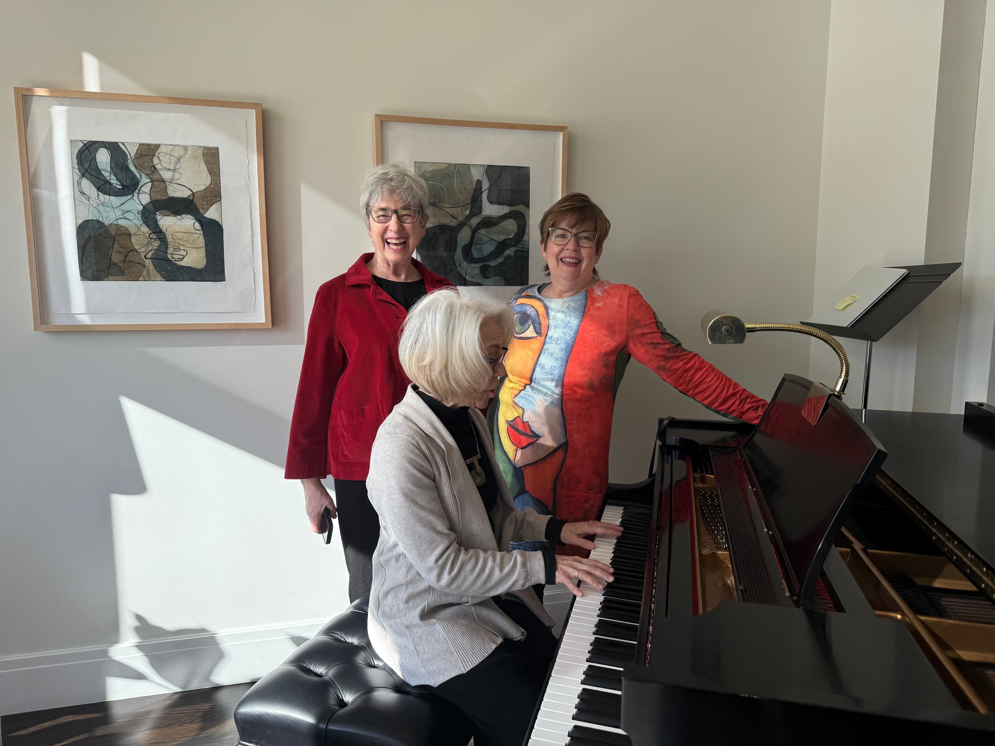 Hands playing the piano while helping a student choose the right vocal repertoire